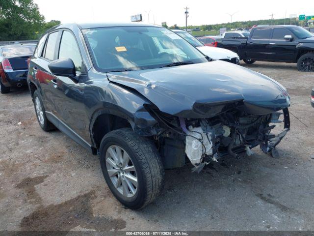  Salvage Mazda Cx